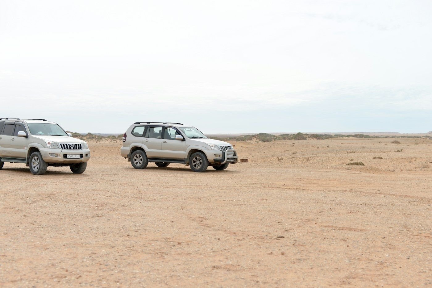 4x4 vehicles on a remote Moroccan desert track