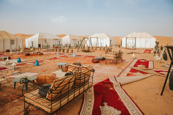 Escape to a peaceful oasis in the middle of the desert and stay in our luxurious desert camp